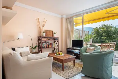 Image de Appartement Carla près de la plage avec grand balcon, vue sur la montagne, Wi-Fi et climatisation