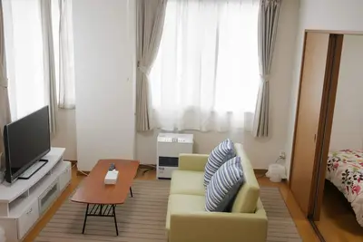 Image de Nk201 À 10-15 minutes à pied de la gare Jr de Sapporo, entièrement équipée avec wifi et air conditionné, jusqu'à 5 personnes peuvent rester