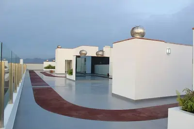 Image de Appartement confortable Near2the Airport Seaview Rooftop