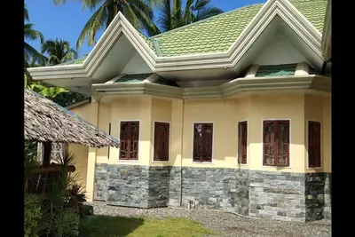Image de Banaybanay à 4 km de la plage de Mogbongcogan