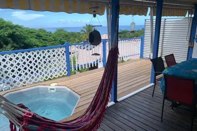 Image de Bungalow 2 chambres accès plage, Spa privatif, très belle vue mer