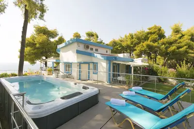 Image de Sani Beach Gallery Villa, parfait pour vos prochaines vacances en famille / amis lux!