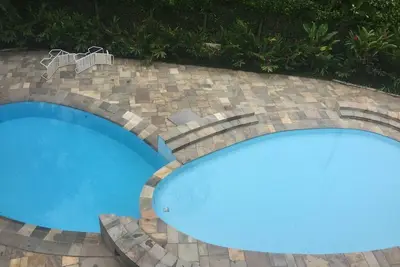 Image de Apt. avec piscine, à 200m de la plage d'Enseada-Ubatuba - pour 8 personnes