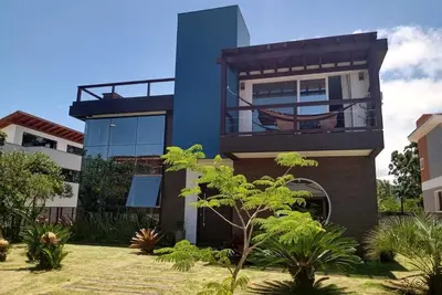 Image de Maison dans une résidence fermée à Praia do Rosa