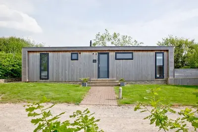 Un pavillon qui peut accueillir 4 personnes dans 2 chambres