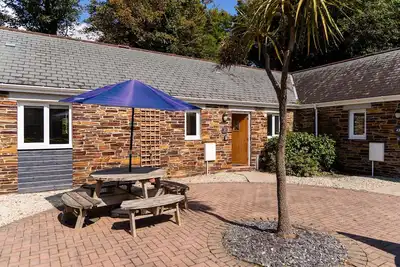 Image de Courtyard Cottage 41 - une roulotte qui peut accueillir 4 personnes dans 2 chambres