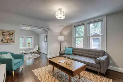 Walk to town from gorgeous, modern upper apartment.