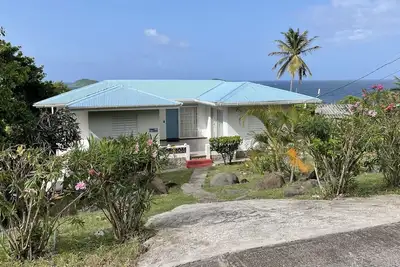 Image de Tradewinds - maison calme avec vue sur l'océan