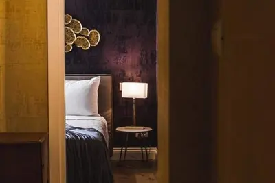 Image de Appartement avec terrasse - Détente et décoration dans le bâtiment historique du centre