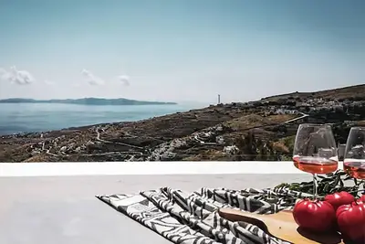 Charmante maison en pierre à proximité des plages, des restaurants et plus à Tinos