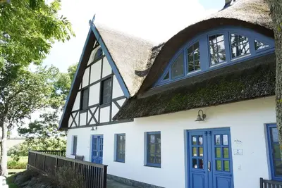 Image de Landhaus Stettiner Haff, superbe grande maison à colombage 5 * avec sauna et cheminée