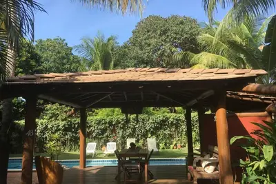 Image de La maison à Praia do Forte avec 3 suites et piscine