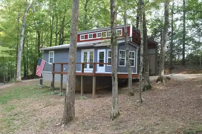 Image de Simplement la voile - Un chalet dans les arbres