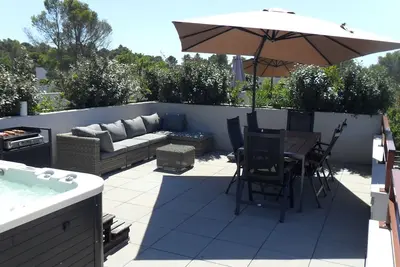 Image de Appartement Toit Terrasse 2 chambres avec Spa Jacuzzi