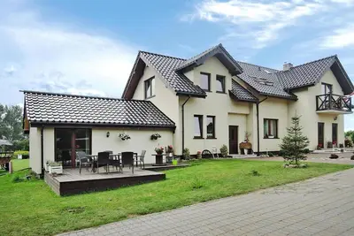 Image de Maison de vacances א Troszyn avec jardin