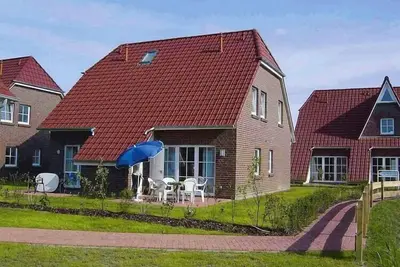 Image de Appartement à Burhave avec piscine partagée