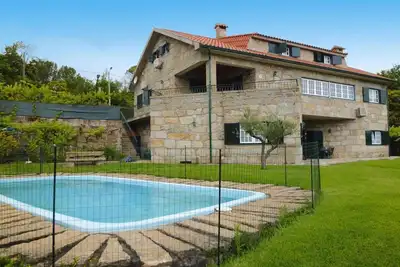 Image de Maison en Granit près du Tâmega avec Piscine