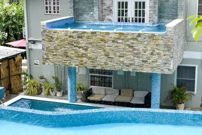 Image de The Hummingbird Villa Nest - Maison de vacances Mayaro Beach avec piscine