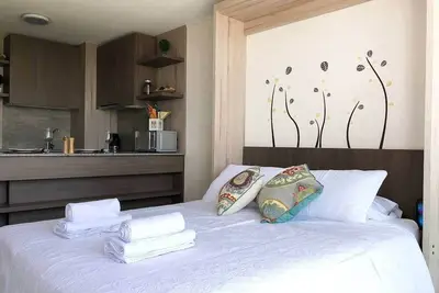 Studio de charme avec vue sur la montagne, piscine et salle de sport