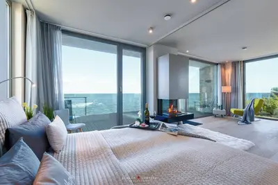 Image de Heimathafen2 - Vue sur la mer Baltique, 1ère rangée, sauna, foyer au gaz, 2 terrasses, directement sur la plage