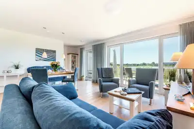 Image de Nis Randers: vue sur l'eau, terrasses, paniers de plage, 2 places de parking, cheminée, bain bien-être, bain à remous, sauna finlandais