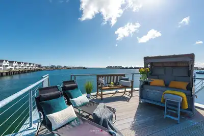 Image de Nouveau Stoertebeker: terrasse ensoleillée, rampe de mise à l'eau, sauna, vue mer