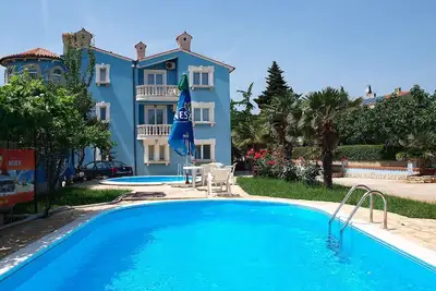 Image de Confortable appartement pour 5 personnes avec climatisation, piscine, Tv, terrasse et animaux admis