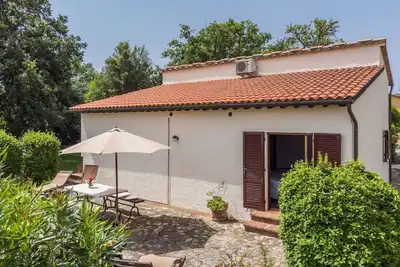 Image de Appartement dans une maison de vacances avec climatisation, piscine, Wifi, patio, vue panoramique
