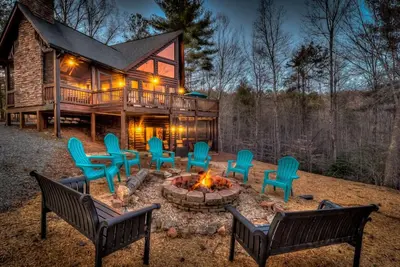 Image de Retraite de raton laveur - Pont blindé | Vie en plein air avec cheminée