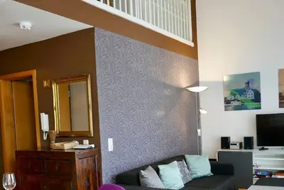 Grand duplex de 2 chambres avec un grand balcon et une place de parking privée