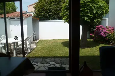 Image de Maison au calme 2 ch. avec jardin privé proche plage et commerces, idéal pour 4 pers.
