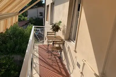 Image de First floor spacious apartment, 550m from the beach, private parking.