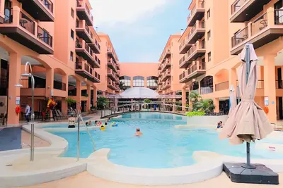 Image de Apto em Resort pé na areia Jbv
