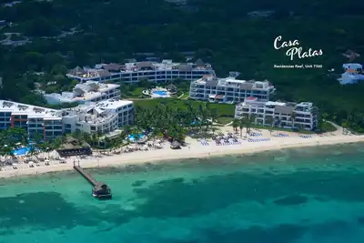 Image de Nouveau propriétaire / Condo Penthouse face à la plage nouvellement décoré avec solarium