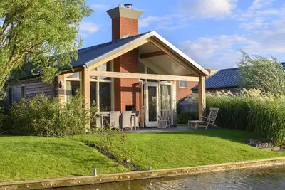 Image de Stay in our energy-neutral Eneva 6 bungalow with private jetty.