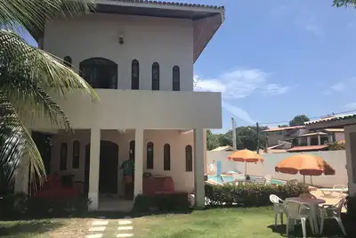 Image de Beach House avec piscine à Barra de Jacuípe