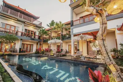 Image de Boutique Villa de charme entourée de palmiers