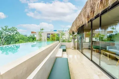 Image de Stunning Tulum Condo: Rooftop Pool & Modern Design