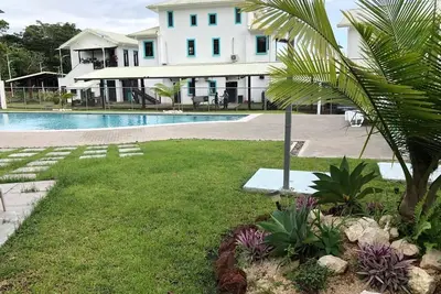 Image de Propre et sûr Condo, à quelques pas de l'océan w / piscine et proche de tout