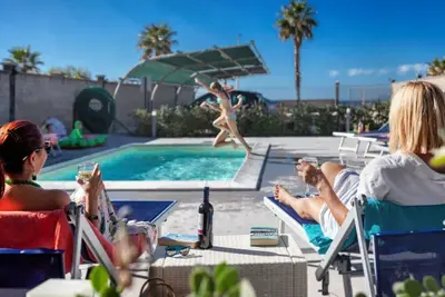 Image de Pistacchio - 2-bedroom apartment  with large lateral sea view terrace and pool in the garden