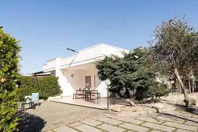 Image de Villa Nettuno. A 150 m des Plages De Sable, 500 m de jardin Privatif et clôturé.