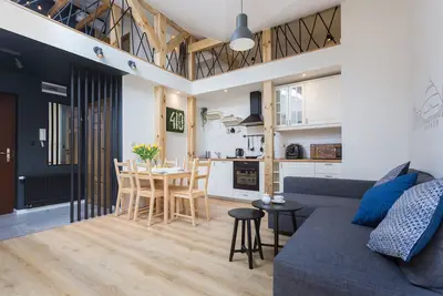 Image de 2-level beautiful Apartment in the City Center. New modern building.