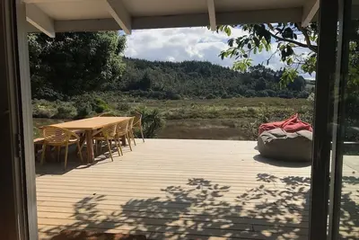 Image de Maison familiale de plage avec ponton privé et piscine spa