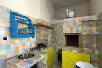 Image de Détendez-vous dans la maison verte à Stromboli Piscità