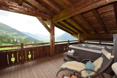 Image de Appartement de luxe directement sur la piste de ski avec sauna, bain à remous