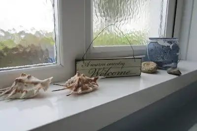 Image de \"Little Nook\", maison accueillante et accueillante à Dunseverick, sur la Causeway Coast