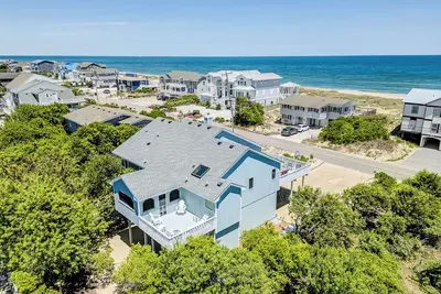 Image de Un pari à terre | 300 pieds de la plage