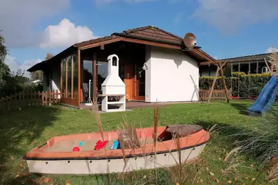 Image de Maison de vacances accueillante pour les familles avec Wi-Fi, vélos et lit