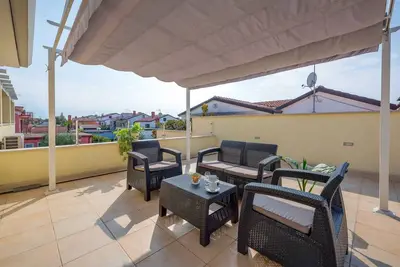 Image de Appartement de vacances avec jardin et air conditionné