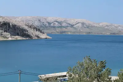 Image de Appartement d'une chambre avec la terrasse et la vue sur le mer Metajna, Pag (A-6336-a)